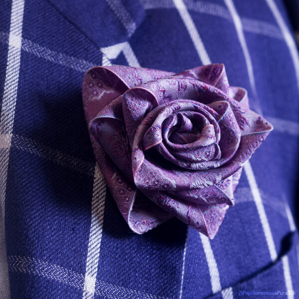 Very Papilionaceous Petal Pin styled from our own rose pink jacquard silk ribbon mounted on a Sterling Silver stick pin. Silk Boutonniere on vintage Kenzo linen jacket..
