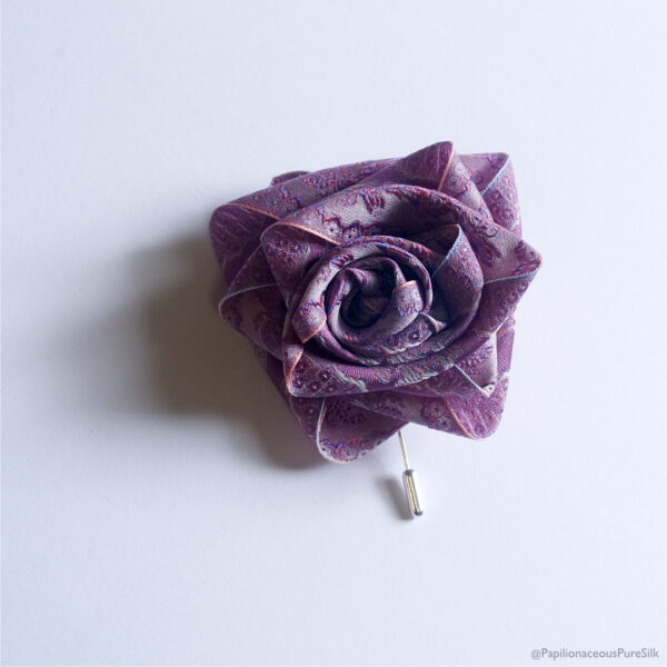 Papilionaceous Petal Pin styled from our own rose pink jacquard silk ribbon mounted on a Sterling Silver stick pin. Made from Papiluionaceous jacquard silk ribbon.