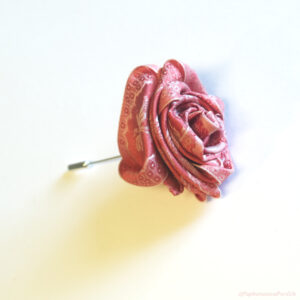 Papilionaceous Petal Pin styled from our own rose pink jacquard silk ribbon mounted on a Sterling Silver stick pin.