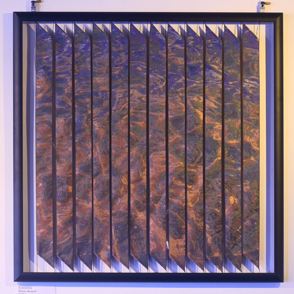 'Solstice'. Woven silk ribbon panel by Robert Ely. 605 x 605mm including frames. Edition of 16. Solstice Sea at Slapton Sands.